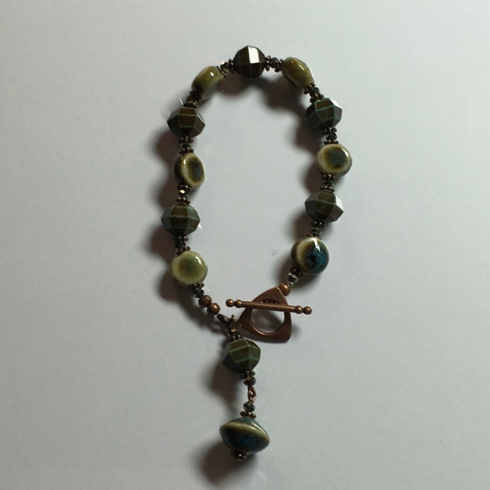 Copper tone Bracelet with green beads